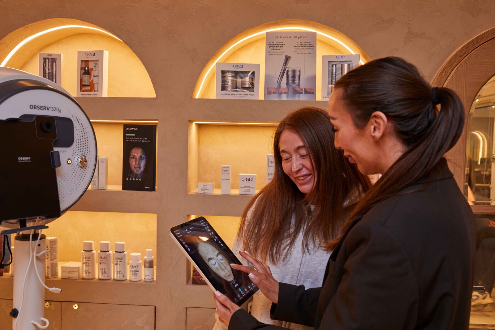 Skin analysis results being reviewed with a patient during a consultation at a Manchester clinic